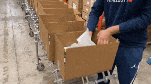 InterFulfillment staff packing rewards for a successful Kickstarter campaign