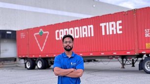 Forklift loading palletized commercial orders onto an FTL transport trailer in Vancouver